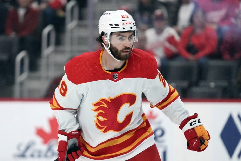 FILE — Calgary Flames centre Dillon Dube (29) skates against the Detroit Red Wings in the first period of an NHL hockey game Sunday, Oct. 22, 2023, in Detroit. (AP Photo/Paul Sancya, File)