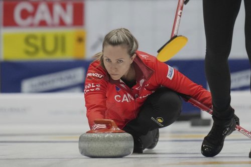 Canada's skip Rachel Homan, releases the stone during the gold medal match against Switzerland at the World Women's Curling Championship in Uijeongbu, South Korea, Sunday, March 23, 2025. (AP Photo/Lee Jin-man)