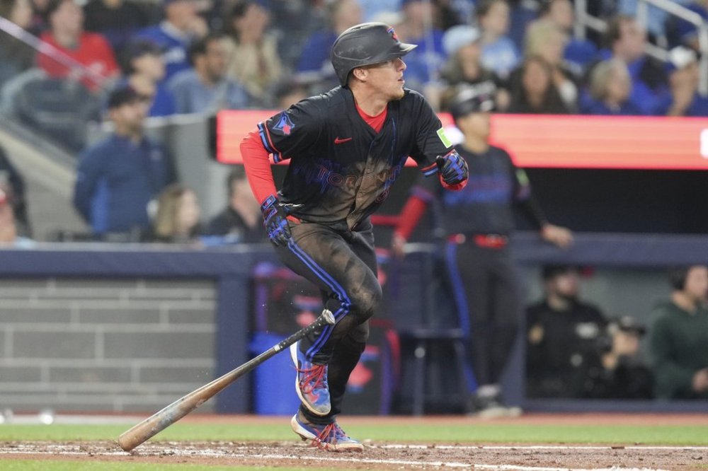 Toronto Blue Jays' Myles Straw (3) hits an RBI double against the Baltimore Orioles during sixth inning MLB baseball action in Toronto on Friday Sept. 12, 2025. THE CANADIAN PRESS/Chris Young