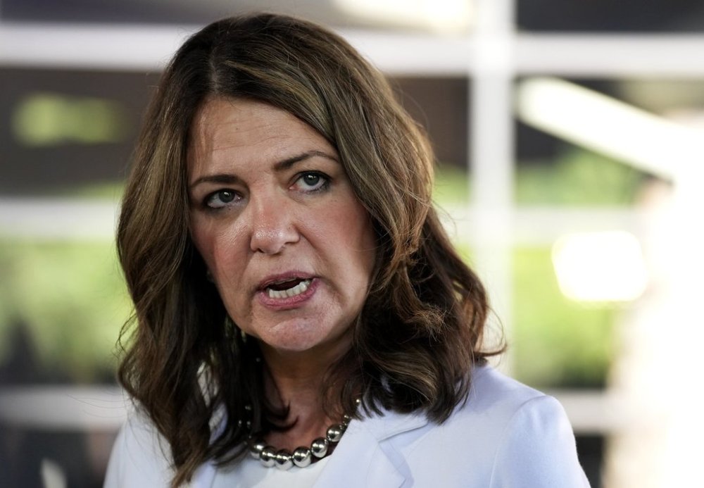 Alberta Premier Danielle Smith speaks to the media during the meeting of Canada’s premiers at Deerhurst Resort in Huntsville, Ont., on Monday, July 21, 2025. THE CANADIAN PRESS/Nathan Denette