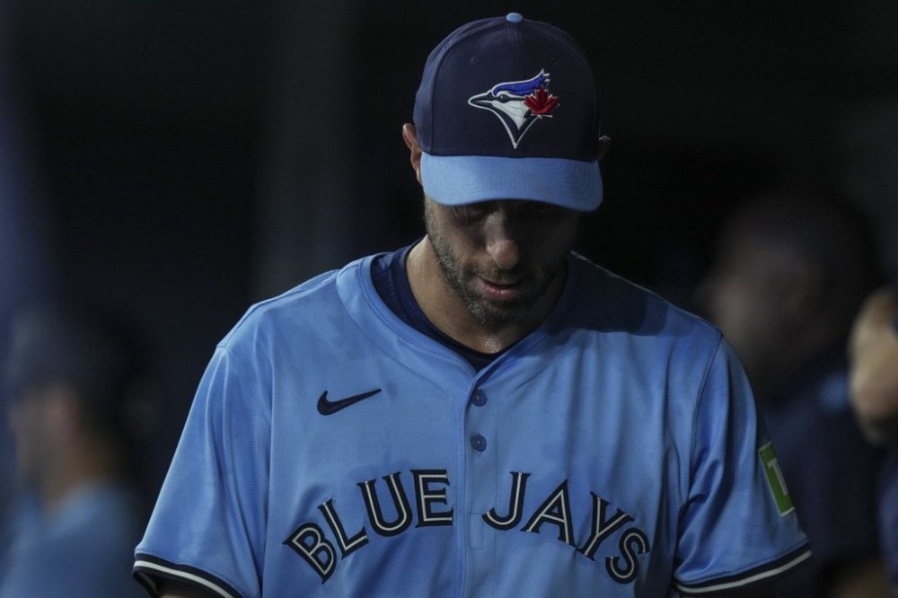 Blue Jays pitcher Max Scherzer (31) stands in the dugout in the first inning of a Major League Baseball game against the Boston Red Sox in Toronto on Sept. 24, 2025. THE CANADIAN PRESS/Chris Young