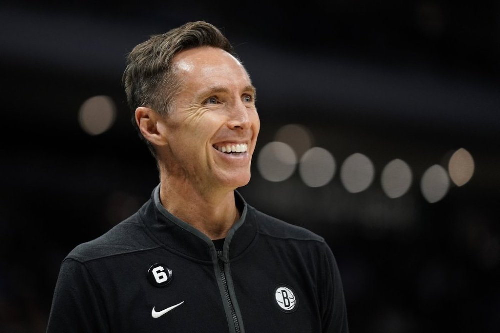 FILE — Brooklyn Nets head coach Steve Nash smiles during the second half of an NBA pre-season basketball game against the Milwaukee Bucks, Oct. 12, 2022, in Milwaukee. (AP Photo/Aaron Gash, File)