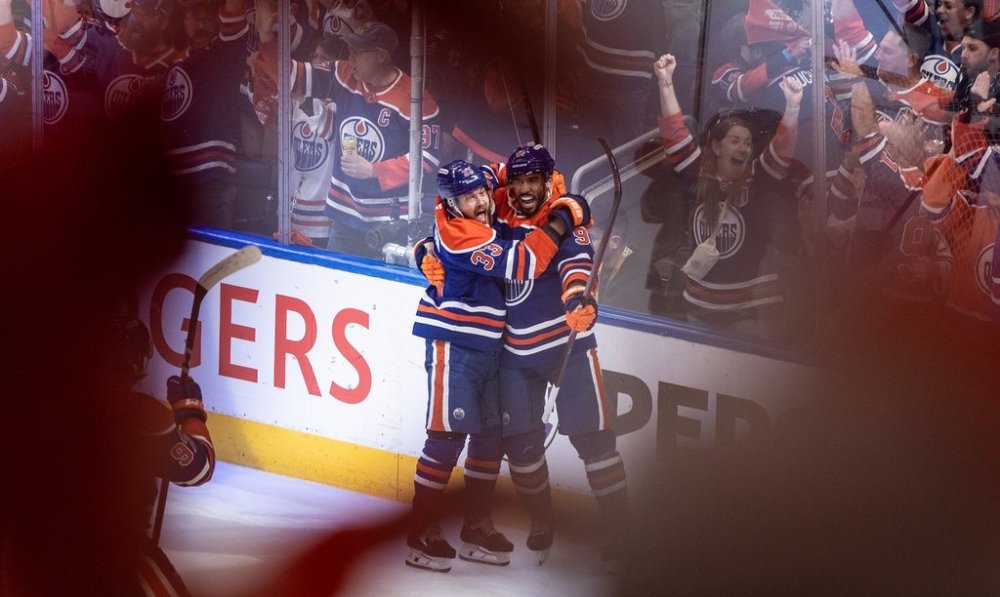 Edmonton Oilers' Viktor Arvidsson (33) and Evander Kane (91) celebrate a goal against the Florida Panthers during the first period in Game 2 of the NHL Stanley Cup final in Edmonton, Friday, June 6, 2025.THE CANADIAN PRESS/Jason Franson