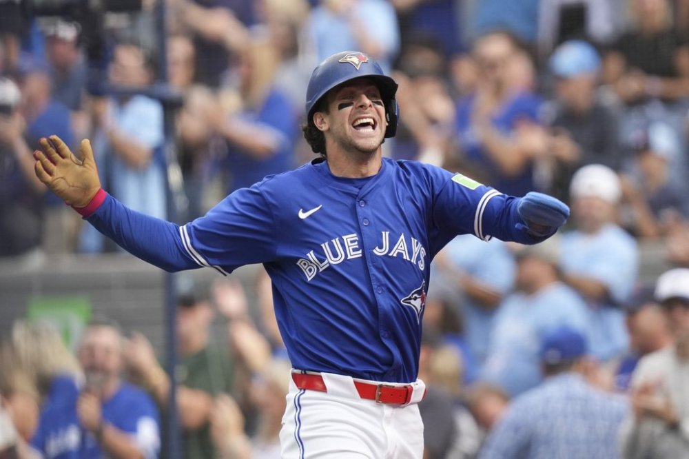 Blue Jays infielder Ernie Clement celebrates after scoring in the second inning of a Major League Baseball game against the Tampa Bay Rays in Toronto on Sept. 27, 2025. THE CANADIAN PRESS/Chris Young