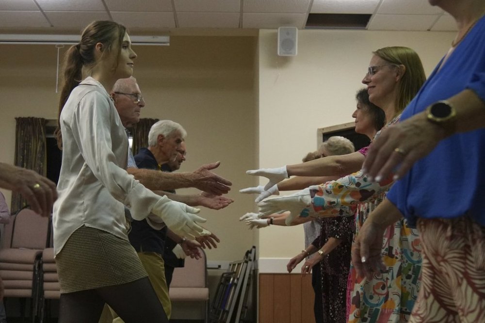 Members of the Hampshire Regency Dancers practice dance in Winchester, England, Sept. 10, 2025, ahead of the 10 days Jane Austen Festival starting on Friday. (AP Photo/Joanna Chan)