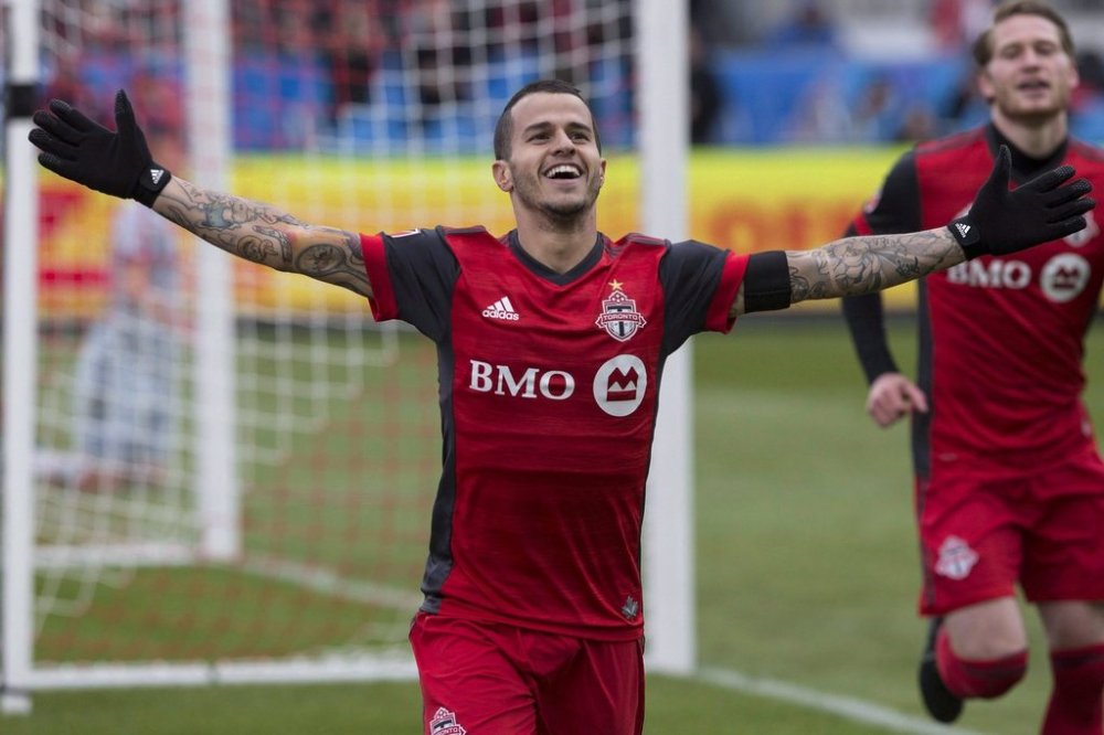 Toronto FC forward Sebastian Giovinco celebrates before his goal was disallowed because teammate Nicolas Hasler was ruled offside after a video review, during first half MLS action against the Chicago Fire in Toronto on Saturday, April 28, 2018. THE CANADIAN PRESS/Chris Young