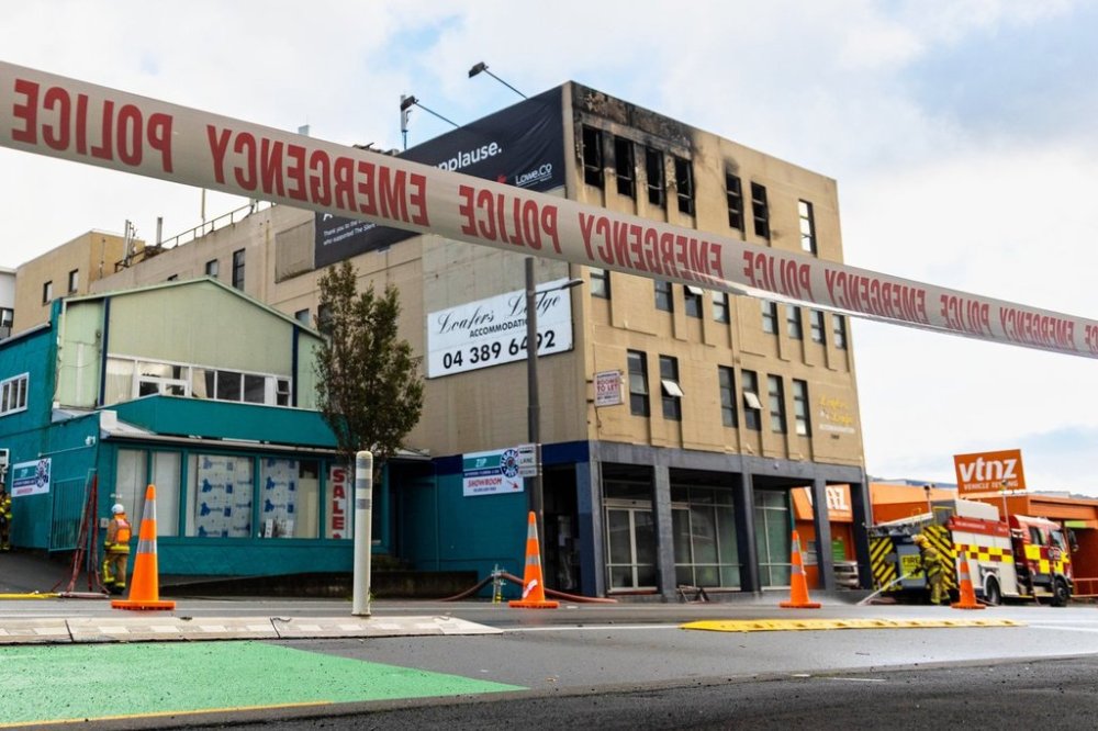 The Loafers Lodge surrounded by a safety tape following a fire in Wellington, New Zealand, May 16, 2025. (Bruce Mackay/The Post via AP)