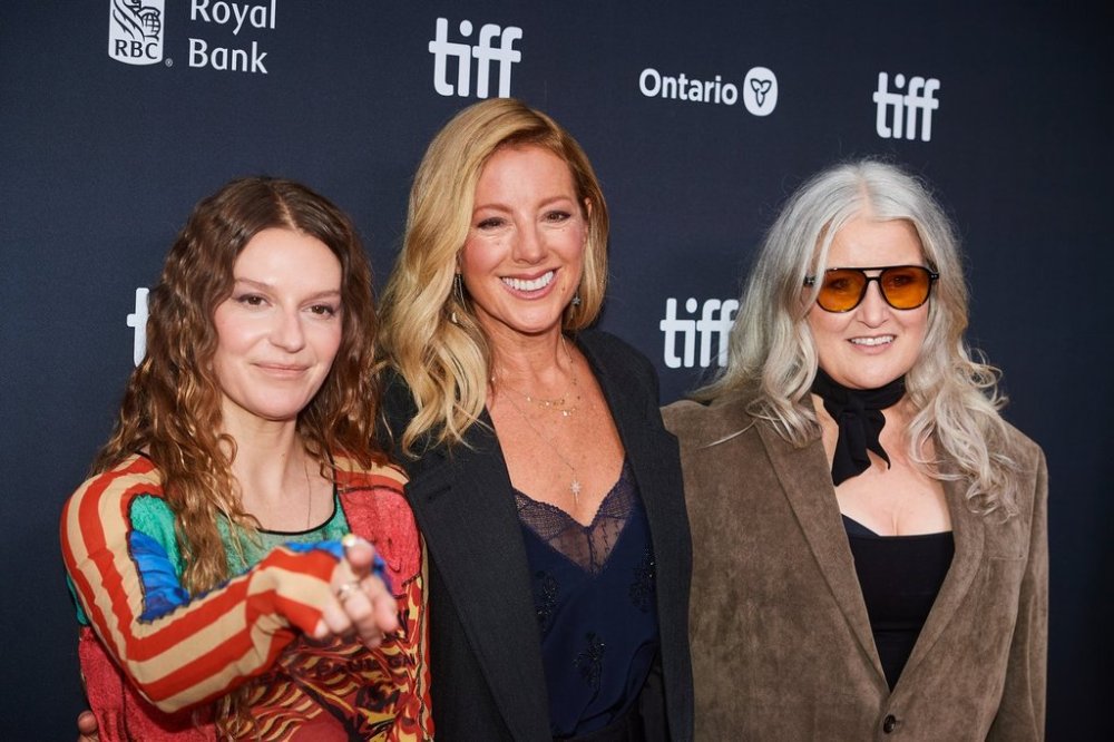Director Ally Pankiw, left to right, singer-songwriters Sarah McLachlan and Paula Cole are photographed on the red carpet for the film