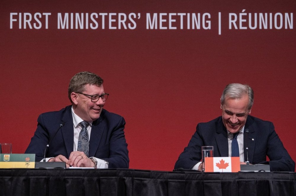 Prime Minister Mark Carney, right, speaks with Premier of Saskatchewan Scott Moe following the First Ministers meeting in Saskatoon, Sask., Monday, June 2, 2025. THE CANADIAN PRESS/Liam Richards