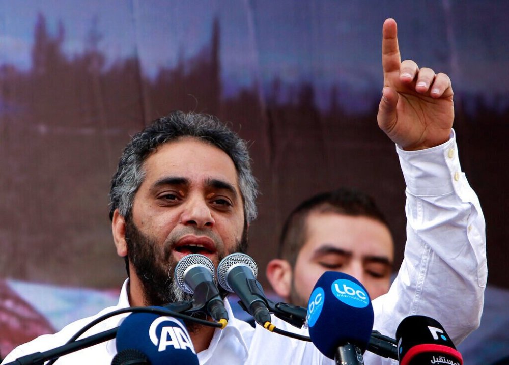 FILE — Lebanese pop idol Fadel Shaker delivers a sermon in support of Syrian rebel fighters and Syrian refugees after Friday prayers, in Beirut, Lebanon, Feb. 8, 2013. (AP Photo/Bilal Hussein, File)