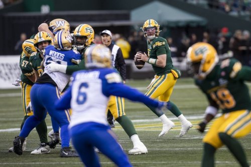 Edmonton Elks quarterback Cody Fajardo (7) looks to pass against the Winnipeg Blue Bombers during first half CFL action in Edmonton on Saturday, Oct. 11, 2025. THE CANADIAN PRESS/Amber Bracken
