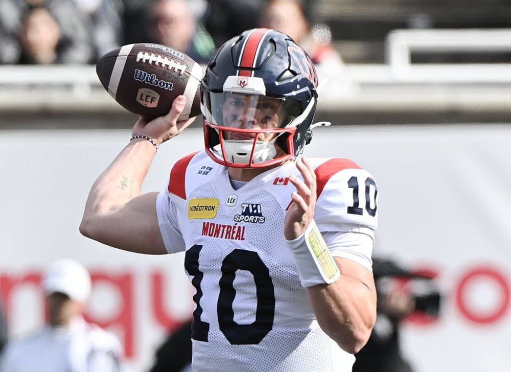 Montreal Alouettes quarterback Davis Alexander throws a pass during first half CFL football action against the Ottawa Redblacks in Montreal, Monday, Oct. 13, 2025. THE CANADIAN PRESS/Graham Hughes