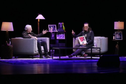 Geddy Lee (right)  holds a discussion with fellow Rush band member Alex Lifeson, as he promotes his book 