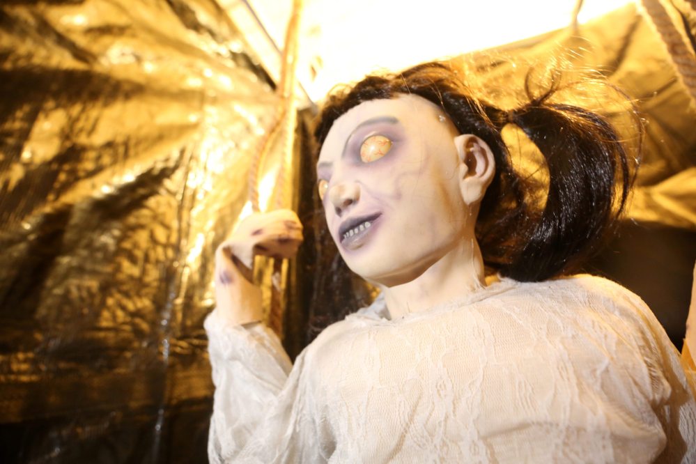 A creepy zombie girl singing on a swing greets those who dare to brave the Scare Away Hunger event on Cedar Bay this week. (Matt Goerzen/The Brandon Sun)