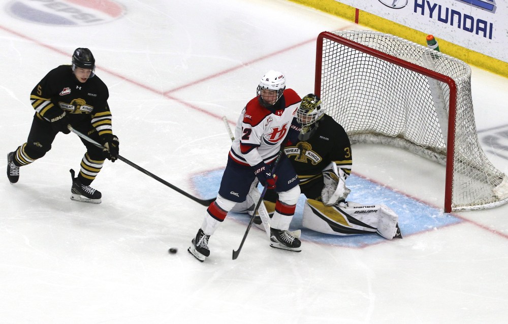 Brandon Wheat Kings goalie Jayden Kraus squares to make a save as Lethbridge Hurricanes forward Tyden Lafournaise of Winnipeg (12) and Brandon defender Dylan Ronald (5) watch the puck during Western Hockey League action at Assiniboine Credit Union Place on Saturday. (Perry Bergson/The Brandon Sun)
Oct. 25, 2025