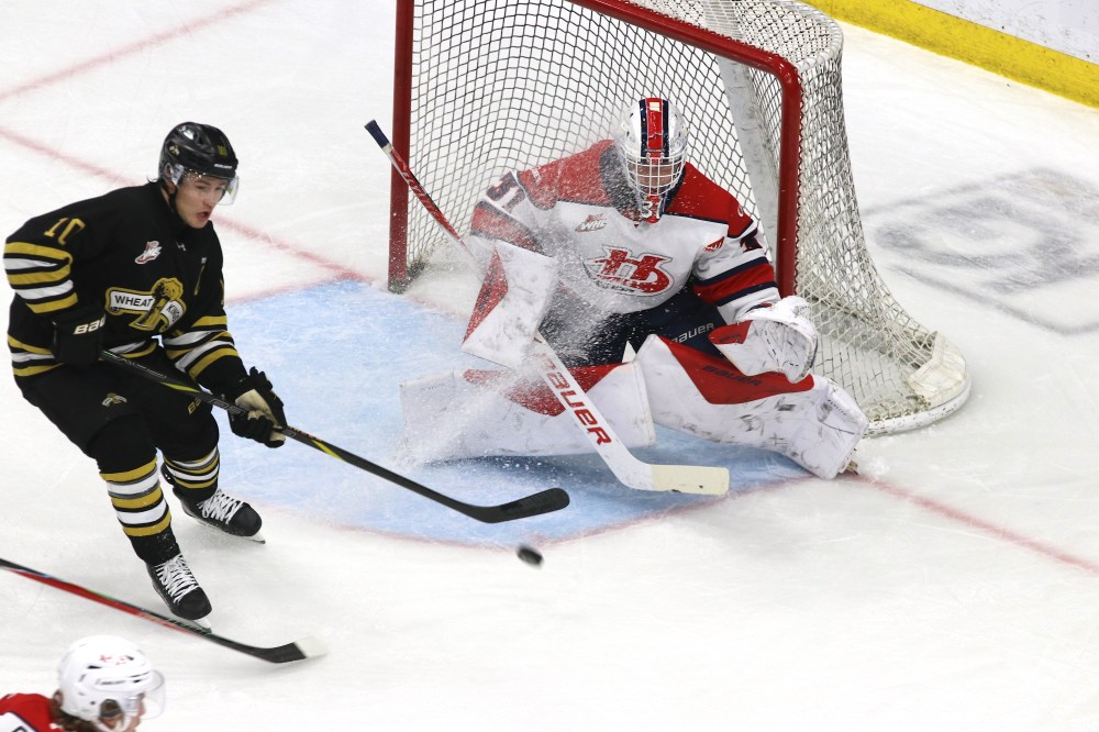 Brandon Wheat Kings forward Caleb Hadland (10) tries to deflect a shot in front of Lethbridge Hurricanes goalie Leif Oaten (31) during Western Hockey League action at Assiniboine Credit Union Place on Saturday. (Perry Bergson/The Brandon Sun)
Oct. 25, 2025