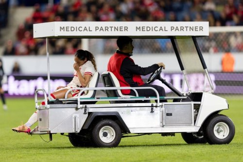 Canada's Olivia Smith is carted off the pitch following an injury during a women's international friendly soccer match between Switzerland and Canada, Friday, Oct. 24, 2025, in Lucerne, Switzerland. (Philipp Schmidli/Keystone via AP)