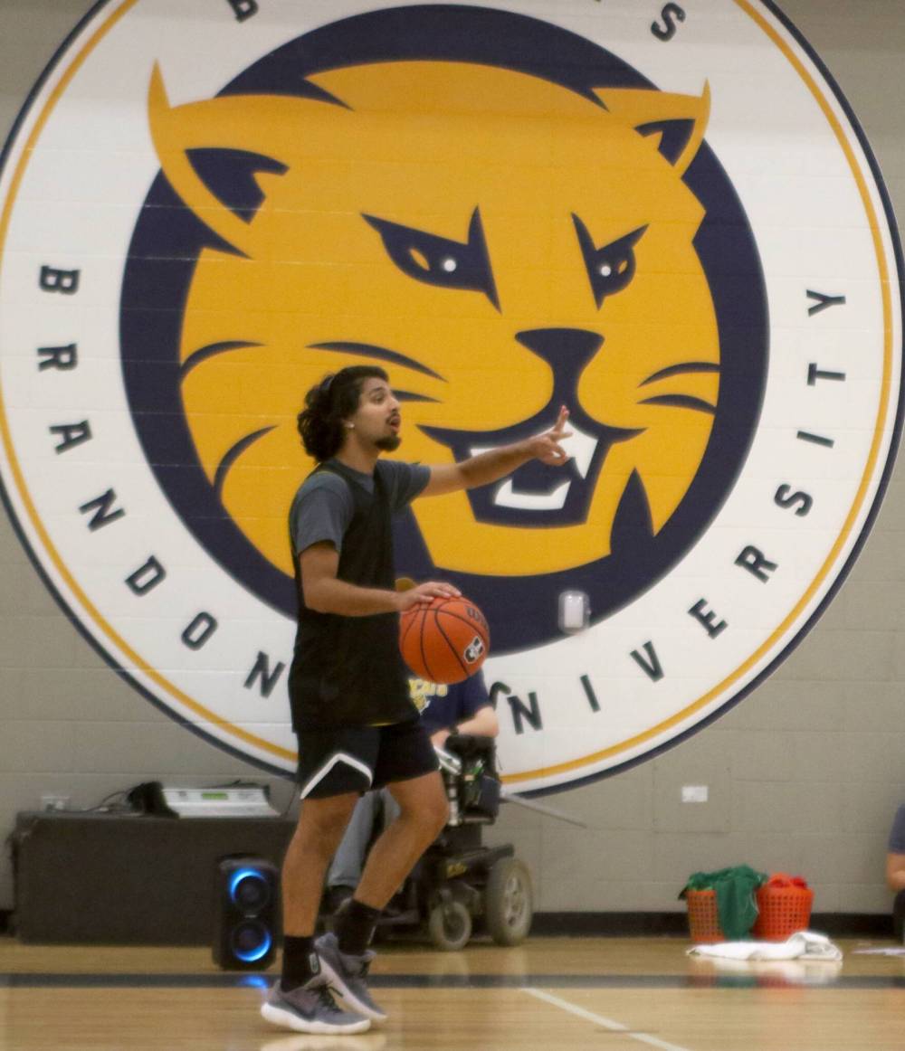 Munroop Gill dribbles the ball up the floor during Brandon University men’s basketball practice on Wednesday. (Thomas Friesen/The Brandon Sun)