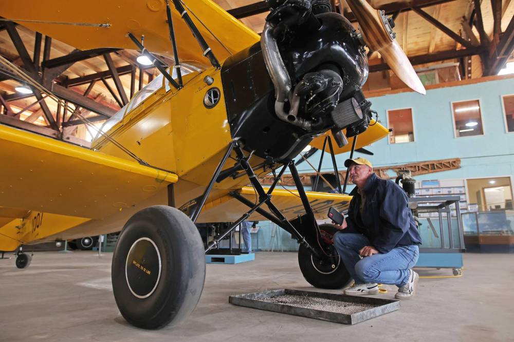 Cam Harrod of Dundas, Ont., looks over a Fleet Finch 1 while taking part in Friday's conference. (Tim Smith/The Brandon Sun)