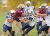 Muqtadir Apena (#1) of the Crocus Plainsmen tries to break through a group of Grant Park Pirates players during high school football action at CPRSS on Friday afternoon. (Tim Smith/The Brandon Sun)