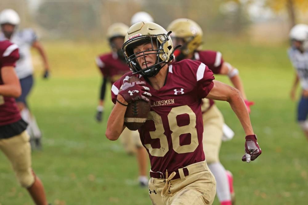 Eric Singfat (#38) attempts a break to the endzone for Crocus. (Tim Smith/The Brandon Sun)