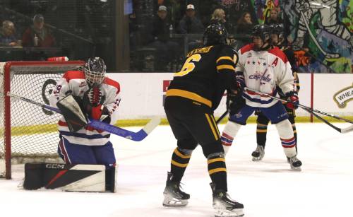 Central Plains Capitals goalie Karsen Dyck (29) makes a shoulder save as Brandon Wheat Kings defenceman Grady Taylor (6) and Capitals defenceman Tyler Kendall (2) look on during Manitoba U18 AAA Hockey League action at J&G Homes Arena on Sunday. Brandon won 12-1. (Perry Bergson/The Brandon Sun)
                                Oct. 5, 2025