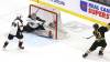 Vancouver Giants goaltender Burke Hood (35) watches the puck hit just inside his elbow on a power-play one-timer by Brandon Wheat Kings forward Jordan Gavin (13) as Giants defenceman Jan Skok (34) looks on during Western Hockey League action at Assiniboine Credit Union Place on Friday. (Perry Bergson/The Brandon Sun)
                                Oct. 10, 2025