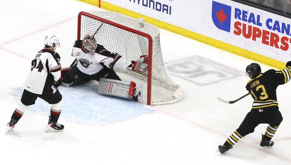 Vancouver Giants goaltender Burke Hood (35) watches the puck hit just inside his elbow on a power-play one-timer by Brandon Wheat Kings forward Jordan Gavin (13) as Giants defenceman Jan Skok (34) looks on during Western Hockey League action at Assiniboine Credit Union Place on Friday. (Perry Bergson/The Brandon Sun)
Oct. 10, 2025