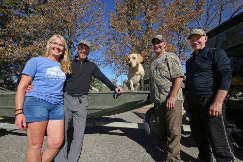 Barb and Owen Steele (left) from Wasaga Beach, Ont., stop for a break at the Riverbank Discovery Centre with longtime friends Mark Francis of Brandon and Shane Gabor of Stonewall after a morning of duck hunting with Rip the dog. (Matt Goerzen/The Brandon Sun)