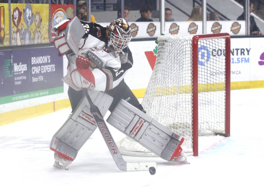 Burke Hood handles the puck as the Vancouver Giants came to Assiniboine Credit Union Place on Friday for a game against the Brandon Wheat Kings. (Perry Bergson/The Brandon Sun)