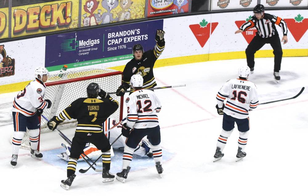 Brandon Wheat Kings forward Joby Baumuller (17) celebrates his goal at the side of the net as his teammate Brady Turko (7) and Kamloops Blazers Evan Markel (33), Ryan Michael (12), Tommy Lafreniere (16) and goaltender Ivans Kufterins (30) look on in Western Hockey League action at Assiniboine Credit Union Place on Thursday. Goatnedder (Perry Bergson/The Brandon Sun)
Oct. 16, 2025