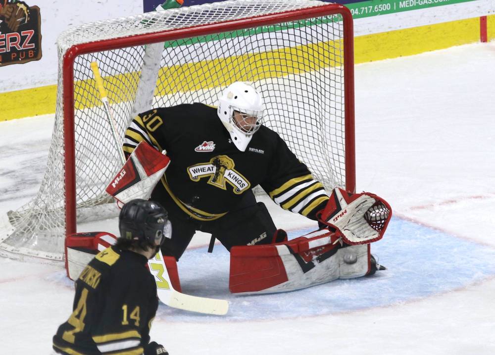 Brandon Wheat Kings goalie Filip Ruzicka (30) makes a glove save on a Kamloops Blazers shot as defenceman Grayson Burzynski (14) looks on in Western Hockey League action at Assiniboine Credit Union Place on Thursday. (Perry Bergson/The Brandon Sun)
Oct. 16, 2025