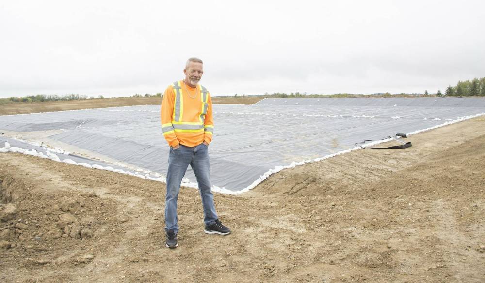 Landfill supervisor Bobby Anderson is seen next to a second landfill cell taking shape at the waste transfer site in Killarney-Turtle Mountain in September. (Killarney Guide)