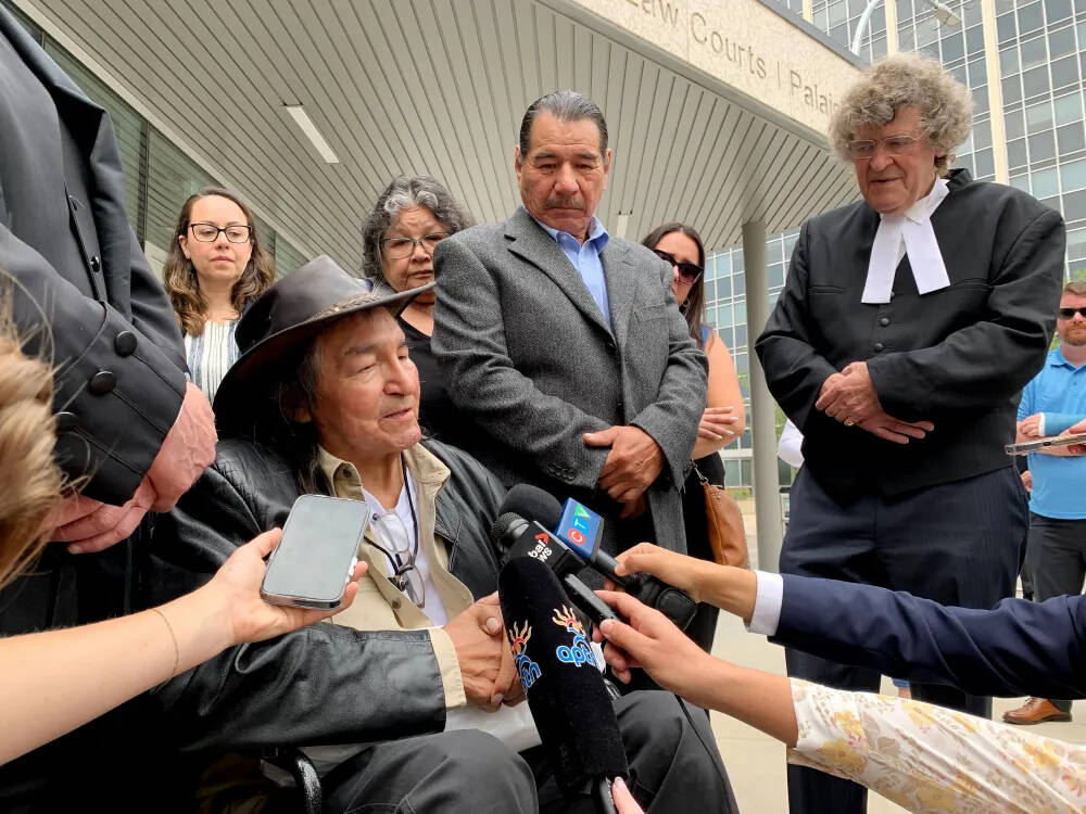 Allan Woodhouse (front, from left), Brian Anderson and James Lockyer, the director of Innocence Canada. The city’s interim director of legal services is recommending council’s executive policy committee approve a contribution to a wrongful conviction settlement for Woodhouse, Anderson and a third man. (Brittany Hobson/The Canadian Press files)