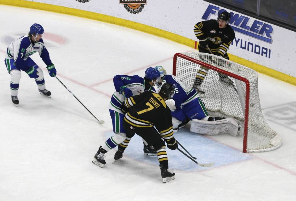 Swift Current Broncos defenceman Josh McGregor (5) of Brandon defends against his former under-18 AAA teammate Brady Turko of the Brandon Wheat Kings (7) as Wheat King forward Caleb Hadland (10) handles the puck behind the net and goalie Joey Rocha (35) and Broncos defenceman Jace McFaul (7) keep an eye on the play during a Western Hockey League game at Assiniboine Credit Union Place on Oct. 12. (Perry Bergson/The Brandon Sun)
Oct. 21, 2025