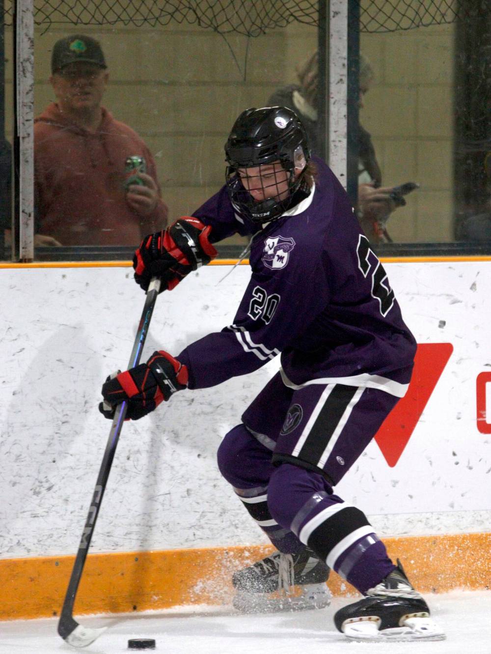 Vincent Massey Vikings defenceman Nazar Sukhetskiy (20) gathers the puck behind the net. (Massimo De Luca-Taronno/The Brandon Sun)