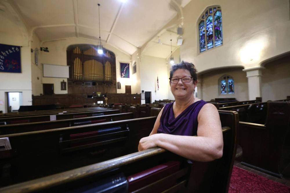 Kathy Lancaster sits in a pew inside Brandon's historic First Presbyterian Church at 339 12th St. on Friday morning. (Matt Goerzen/The Brandon Sun)