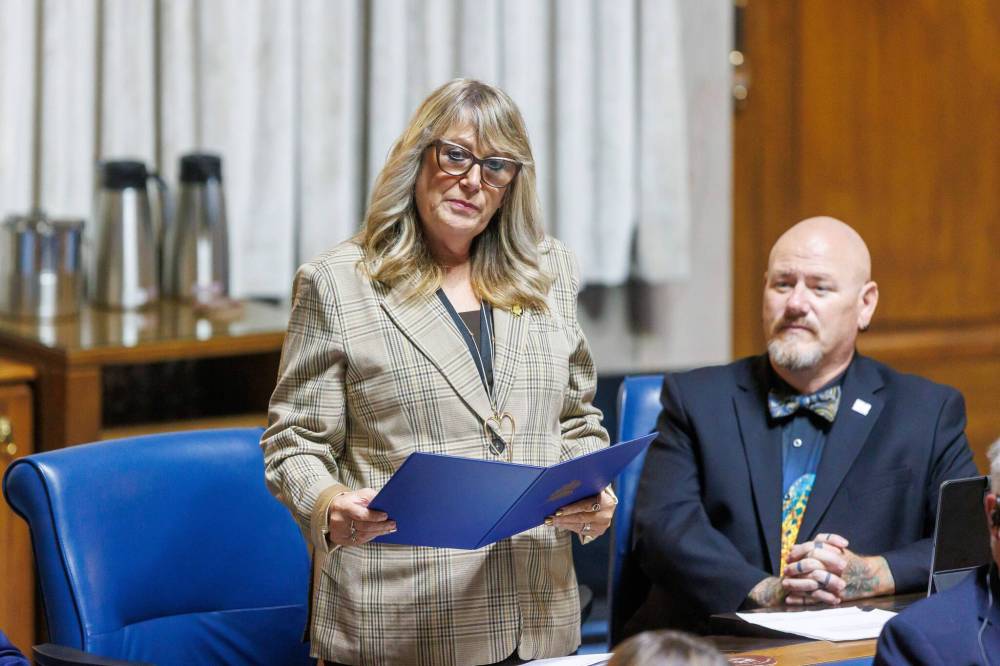 Spruce Woods MLA Colleen Robbins stands in the Manitoba legislature during question period on Oct. 1. (Mike Deal/Winnipeg Free Press files)