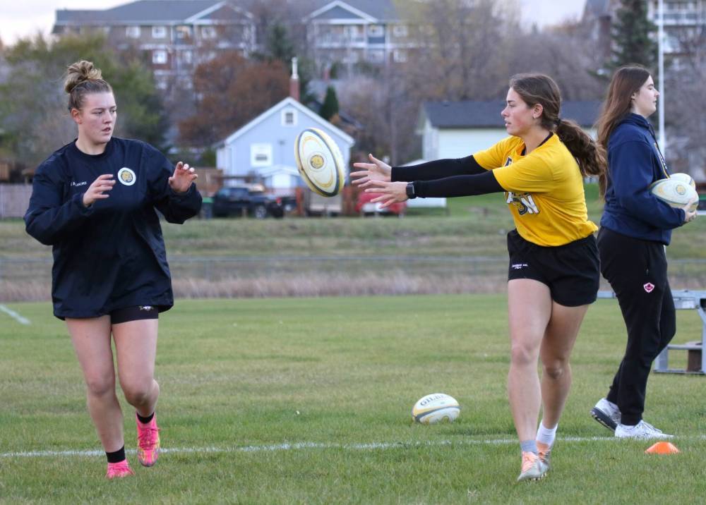 Kypling Black, left, Raegan Ricard and the BU women’s rugby team open the Prairie University Women’s Rugby Conference championship at home today against Mount Royal University. (Thomas Friesen/The Brandon Sun)