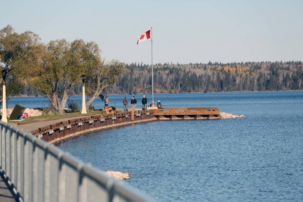 Visitors enjoy the autumn weather at Clear Lake on Friday. A judicial review of this year’s ban on motorized boats was launched in June by a coalition of community groups called Fairness for Clear Lake. (Connor McDowell/The Brandon Sun)