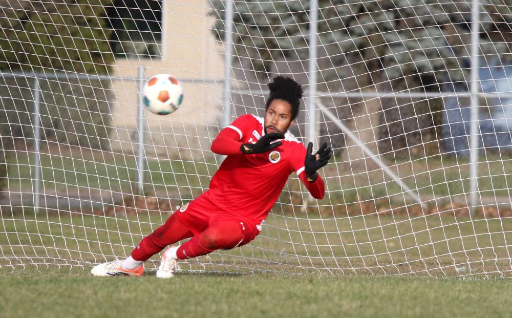Matheus Sousa tries to save the penalty that ended the game in extra time. (Thomas Friesen/Brandon Sun)