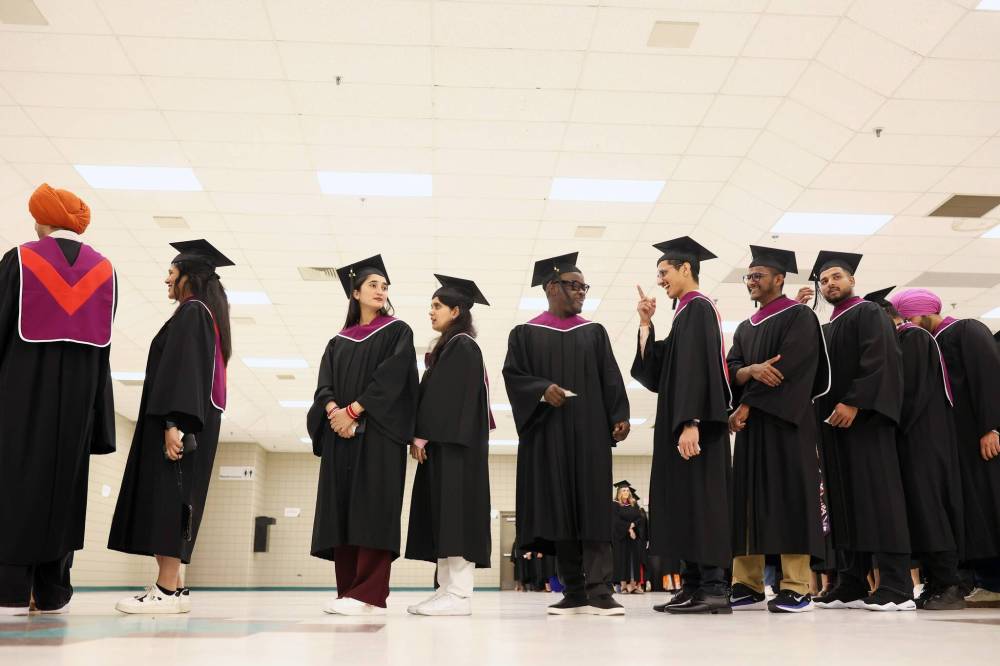Students line up for the processional for Assiniboine College’s annual fall graduation ceremony at the Keystone Centre’s Manitoba Room on Thursday. (Photos by Tim Smith/The Brandon Sun)