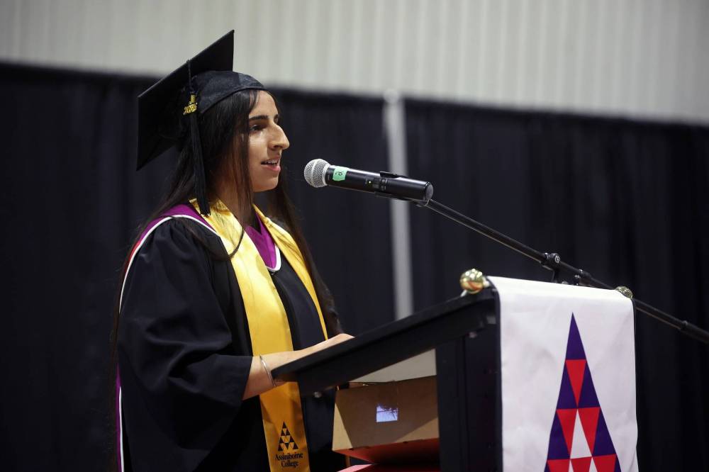 Valedictorian Jaskomalveer Kaur delivers her address during Thursday’s ceremony.