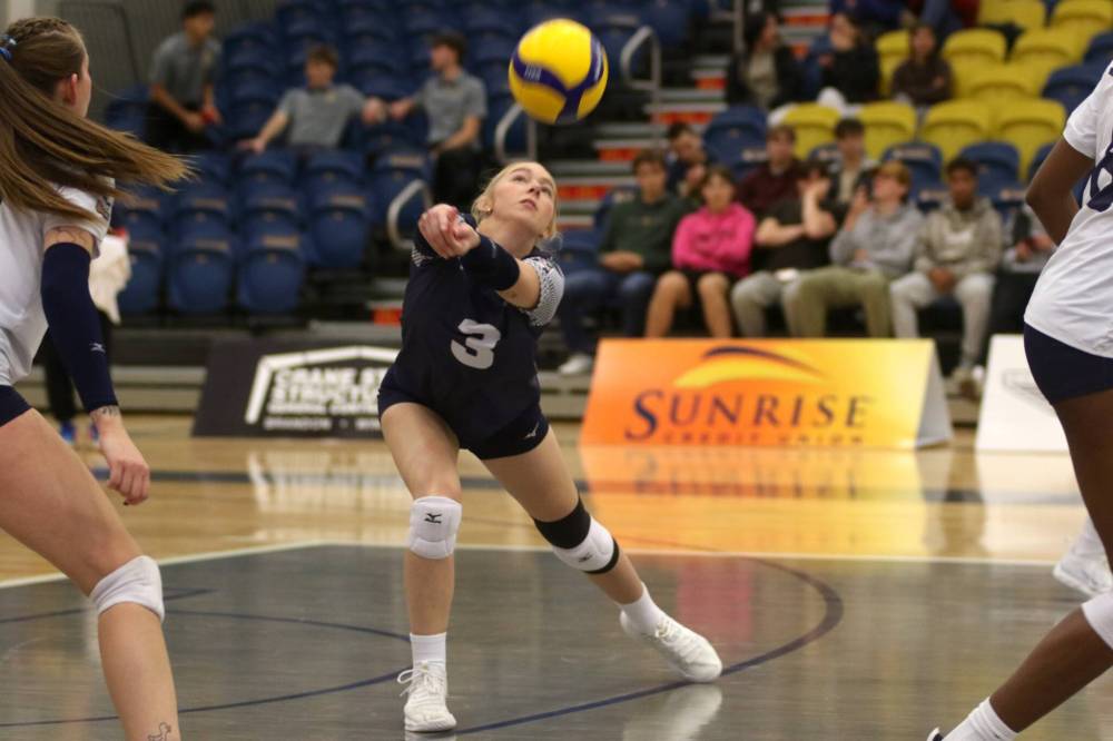 Brandon's Brooklyn Pratt passes a ball against the Mount Royal Cougars during their Canada West women's volleyball match at the Healthy Living Centre on Friday. (Thomas Friesen/The Brandon Sun)