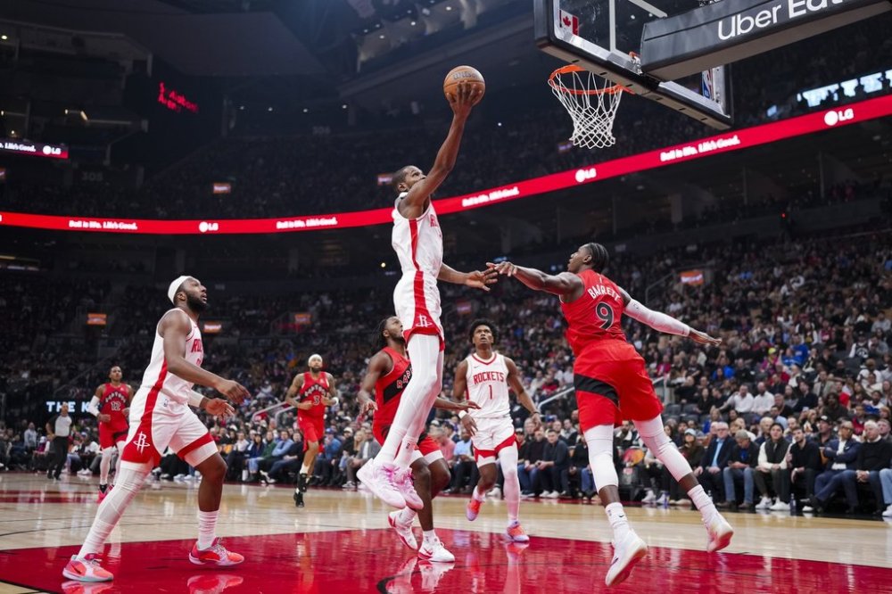Houston Rockets forward Kevin Durant (7) drives the net during the first half of NBA basketball action in Toronto, Wednesday, Oct. 29, 2025. THE CANADIAN PRESS/Thomas Skrlj