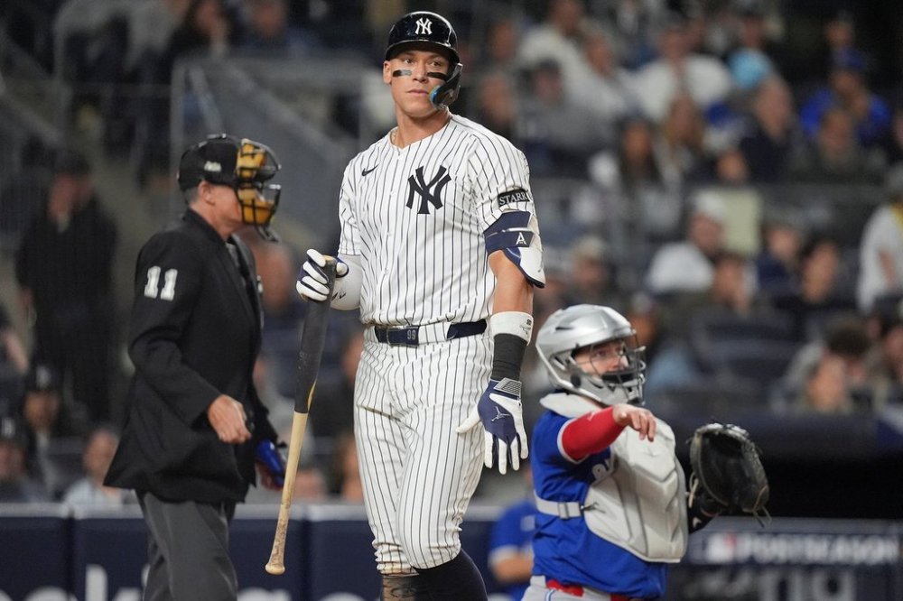 New York Yankees' Aaron Judge reacts after striking out against the Toronto Blue Jays during the eighth inning of Game 4 of baseball's American League Division Series, Wednesday, Oct. 8, 2025, in New York. (AP Photo/Frank Franklin II)
