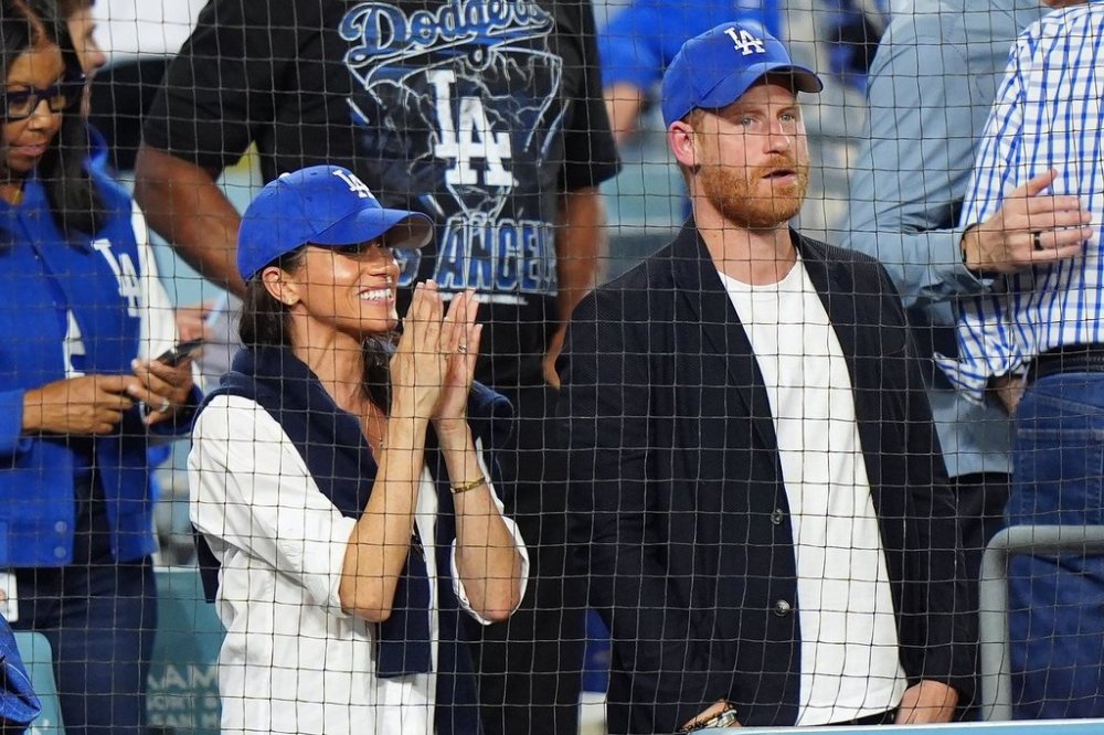 Prince Harry and Meghan Markle look on during seventh inning Game 4 World Series playoff MLB baseball action between the Los Angeles Dodgers and the Toronto Blue Jays in Los Angeles on Tuesday, Oct. 28, 2025. THE CANADIAN PRESS/Frank Gunn