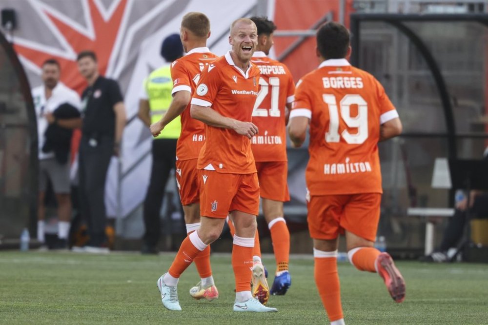 Forge FC's Kyle Edward Bekker (10) reacts following a goal against the Vancouver Whitecaps during first half Canadian Championship semifinal soccer action in Hamilton, on Thursday, August 13, 2025. THE CANADIAN PRESS/Nick Iwanyshyn