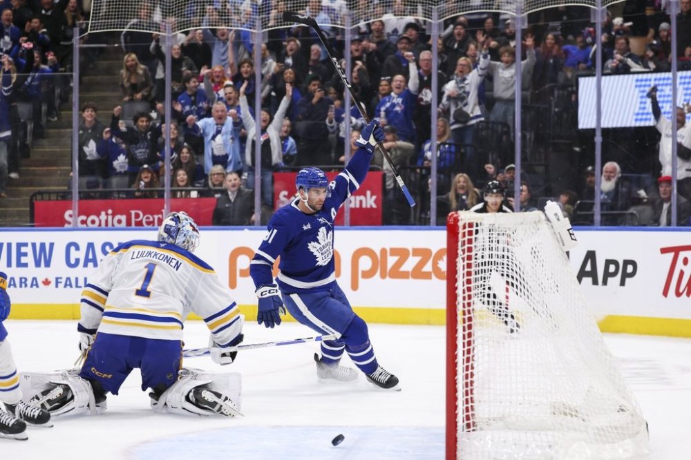 Maple Leafs centre John Tavares (91) celebrates his overtime goal against the Buffalo Sabres in Toronto on Saturday, Oct. 25, 2025. THE CANADIAN PRESS/Nick Iwanyshyn