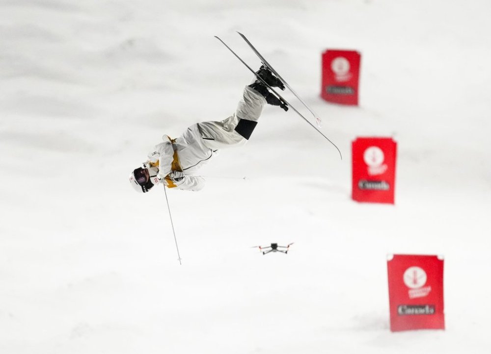 Canada's Mikael Kingsbury skis in the semifinal run in the men's World Cup freestyle skiing moguls in Saint-Come, Que., Friday, Jan. 31, 2025. Kingsbury took gold. THE CANADIAN PRESS/Sean Kilpatrick